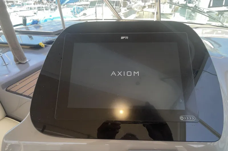 Touchscreen display on 2006 Cruisers Yachts 370 Express, showing "Axiom" interface.