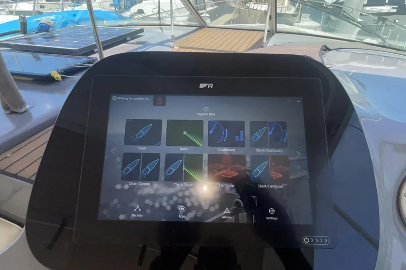 Touchscreen navigation system on 2006 Cruisers Yachts 370 Express, displaying charts and radar.
