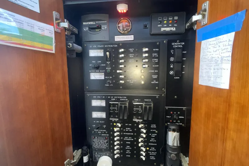 Electrical control panel inside a 2006 Cruisers Yachts 370 Express boat.