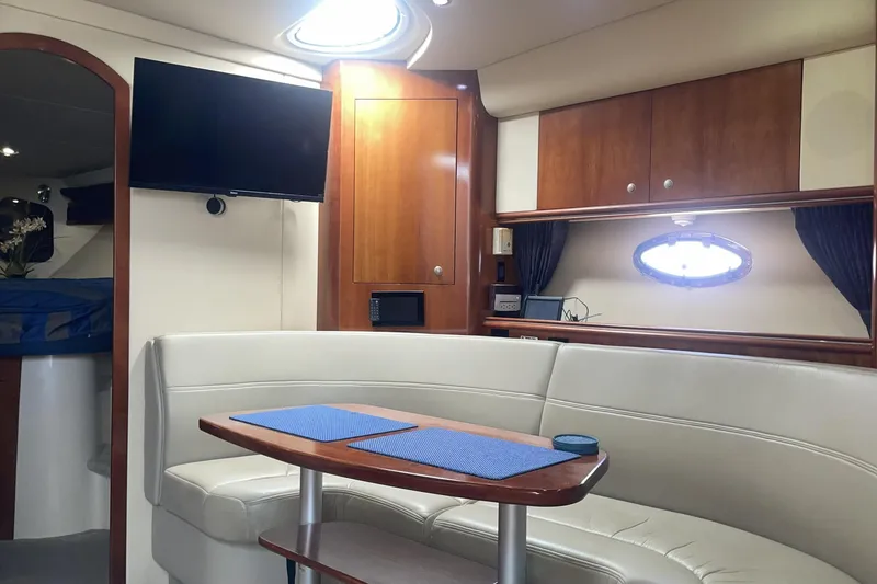 Interior of 2006 Cruisers Yachts 370 Express with cozy seating and modern amenities.
