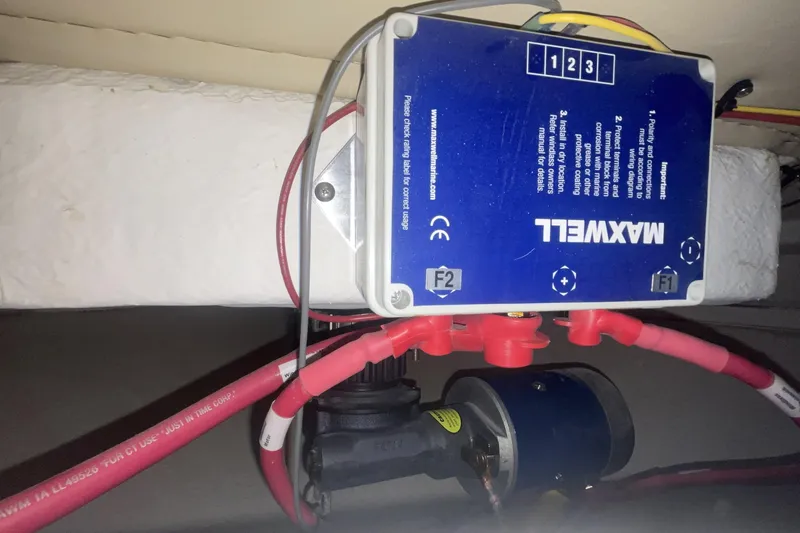 Electrical system components on a 2006 Cruisers Yachts 370 Express, featuring Maxwell equipment.