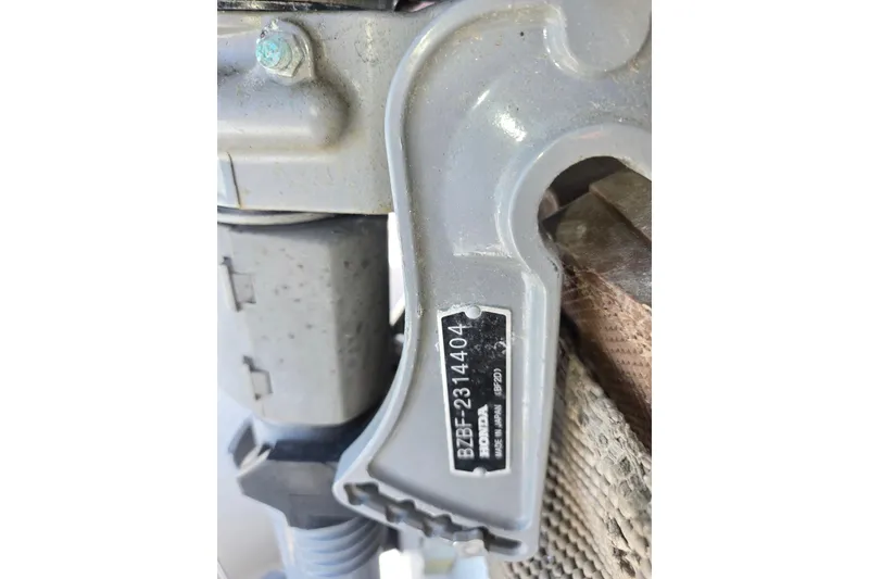 Close-up of a 2006 Cruisers Yachts 370 Express engine part with serial number.