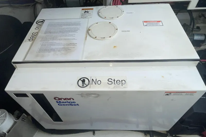 Onan Marine GenSet in 2006 Cruisers Yachts 370 Express engine room, labeled "No Step."