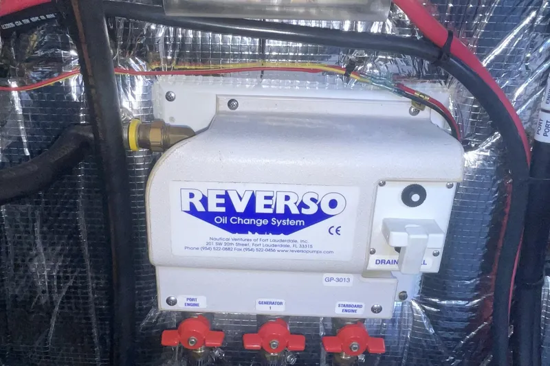 Reverso oil change system in 2006 Cruisers Yachts 370 Express engine room.
