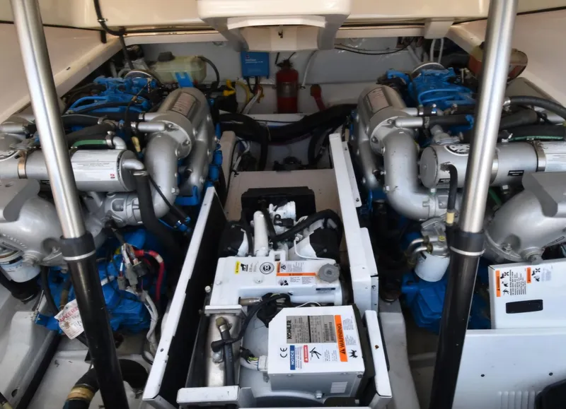 Engine room of 2012 Tiara Yachts 3100 Coronet with dual engines and equipment.