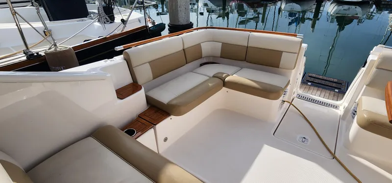 2012 Tiara Yachts 3100 Coronet with spacious seating at marina.
