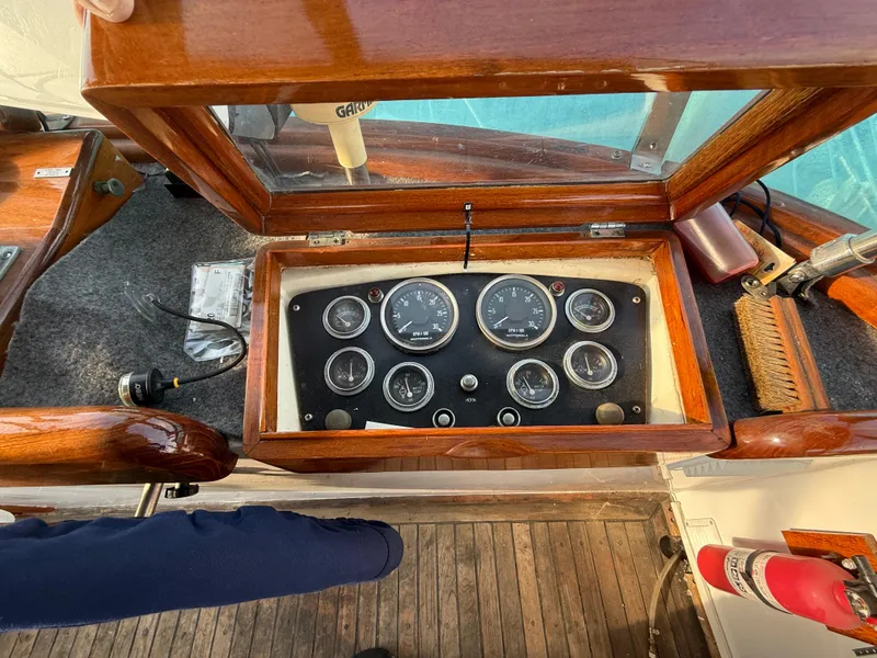 1978 C & L 37 boat dashboard with gauges and wooden trim.