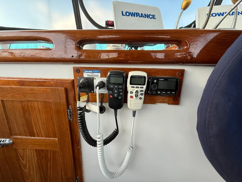 Boat cockpit with communication devices and Lowrance equipment, C & L 37, 1978 model.