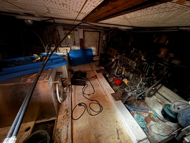 Engine room of a 1978 C & L 37 boat, featuring machinery and equipment.