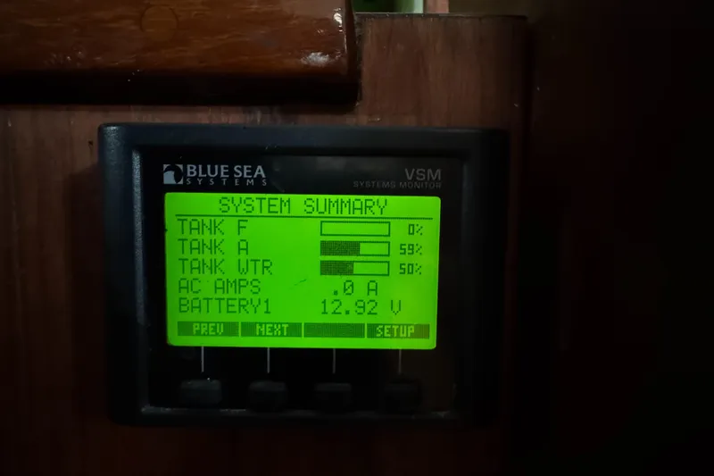 Blue Sea Systems monitor displaying tank levels and battery voltage on a 1981 Morgan 416 Out Island.