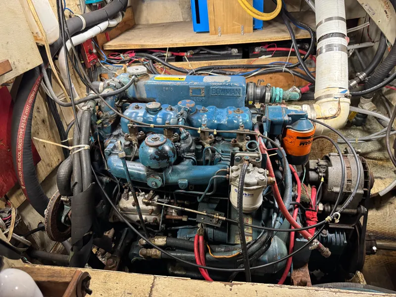 Engine of a 1981 Morgan 416 Out Island sailboat, featuring intricate wiring and components.