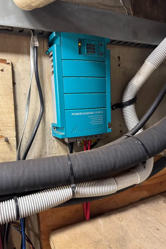 Blue Mastervolt power charger installed on a 1981 Morgan 416 Out Island sailboat.