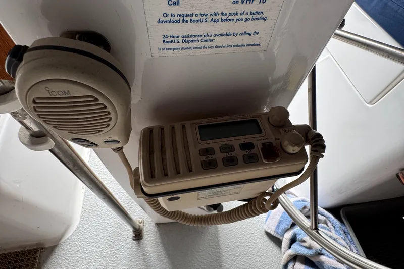 ICOM marine radio on 1981 Morgan 416 Out Island sailboat, mounted with microphone.
