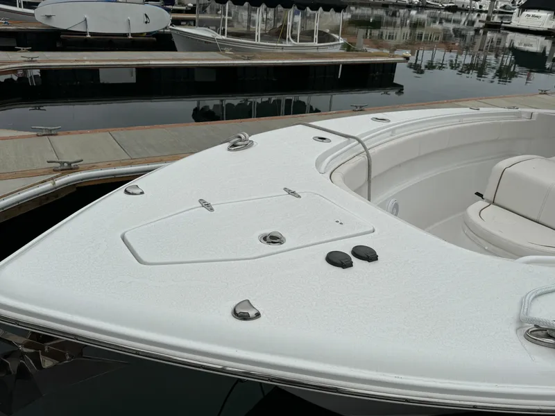 2021 Sea Hunt Gamefish 30 Coffin Box boat docked at marina.