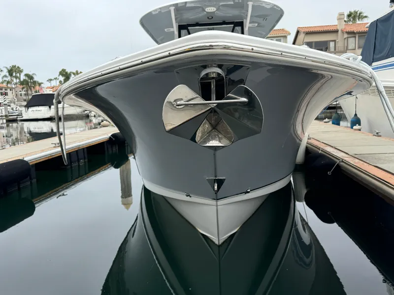 2021 Sea Hunt Gamefish 30 Coffin Box boat docked in marina, front view.