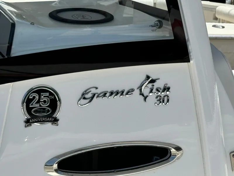 25th Anniversary Sea Hunt Gamefish 30 Coffin Box, 2021 model boat emblem.