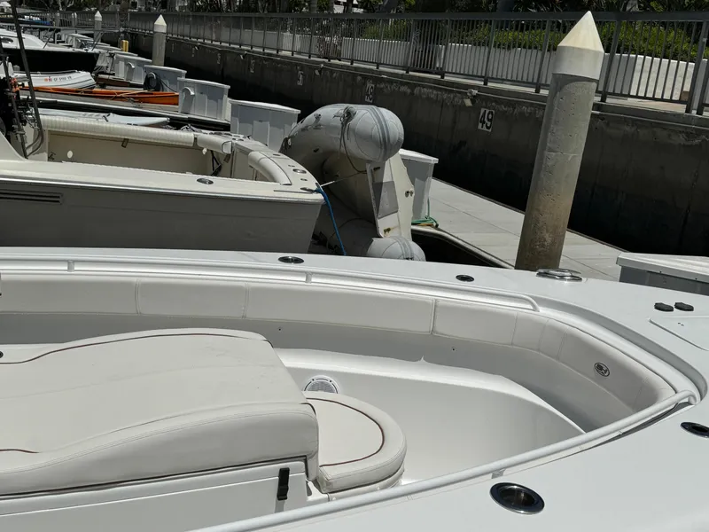 2021 Sea Hunt Gamefish 30 Coffin Box boat docked at marina.