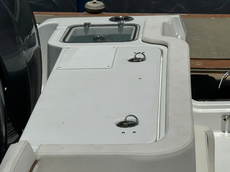 2021 Sea Hunt Gamefish 30 Coffin Box boat deck with storage compartments.