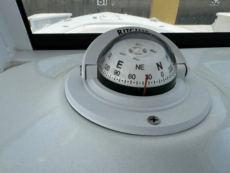 Compass on 2021 Sea Hunt Gamefish 30 Coffin Box boat dashboard.