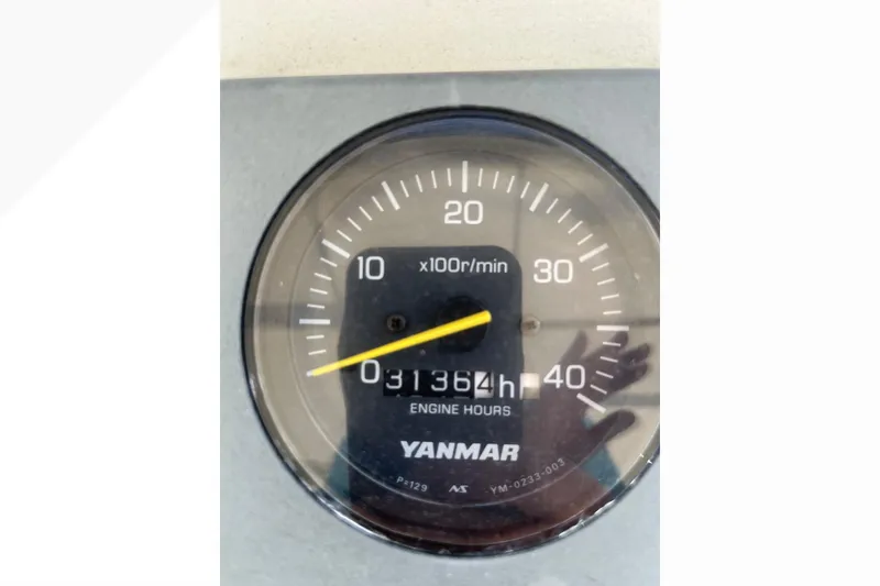 Yanmar engine hour meter showing 3136 hours on a 1971 Pacifica 44 Convertible.