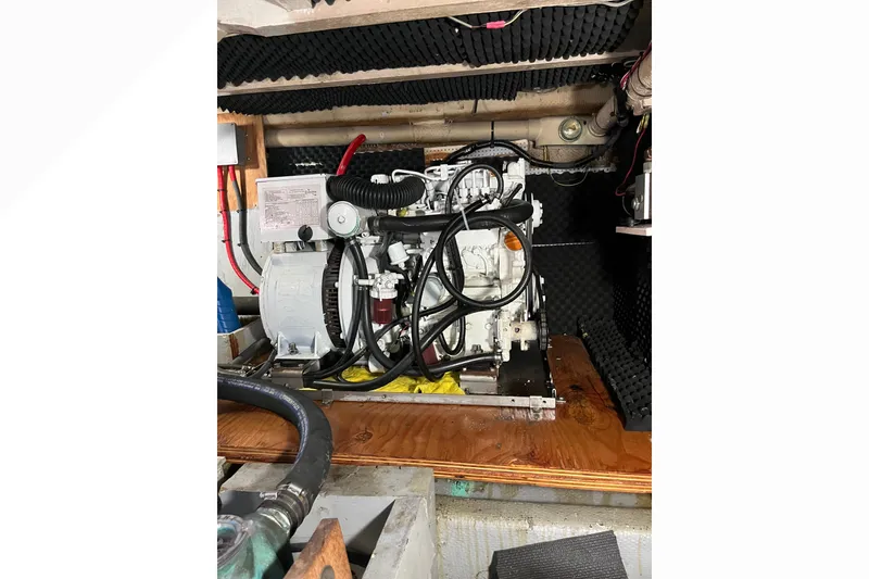 Engine compartment of a 1971 Pacifica 44 Convertible boat, showcasing mechanical components.