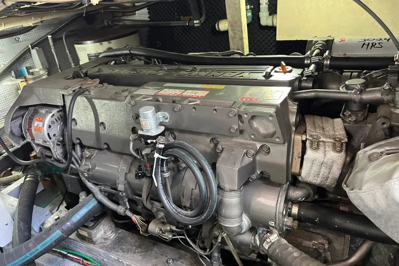 Engine of a 1971 Pacifica 44 Convertible boat, showcasing intricate mechanical components.