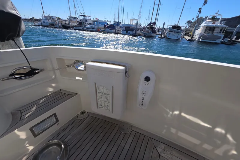 2000 McKinna 48 Pilothouse yacht deck with marina view.