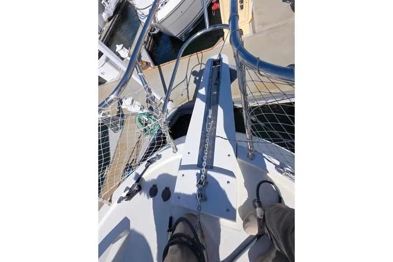 Bow view of 2000 McKinna 48 Pilothouse yacht at dock.