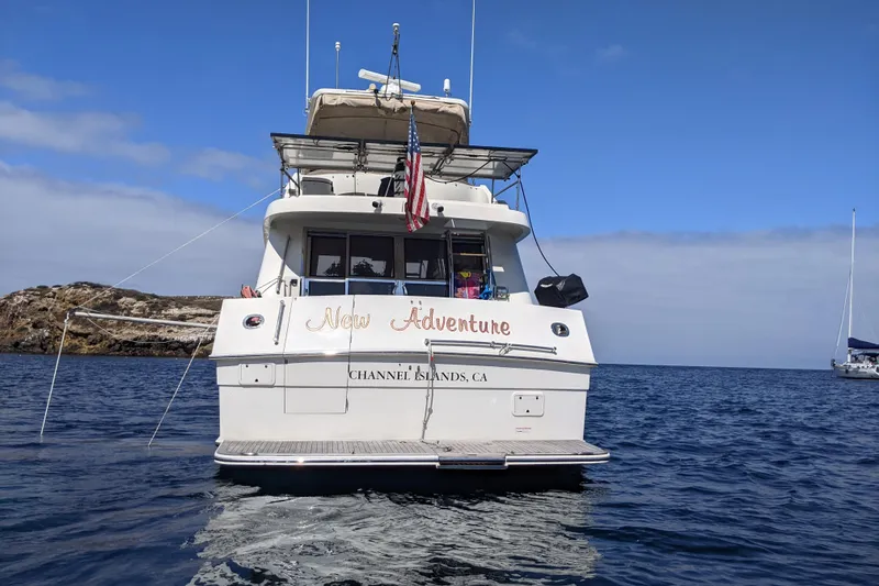 2000 McKinna 48 Pilothouse yacht named "New Adventure" on the water near Channel Islands.