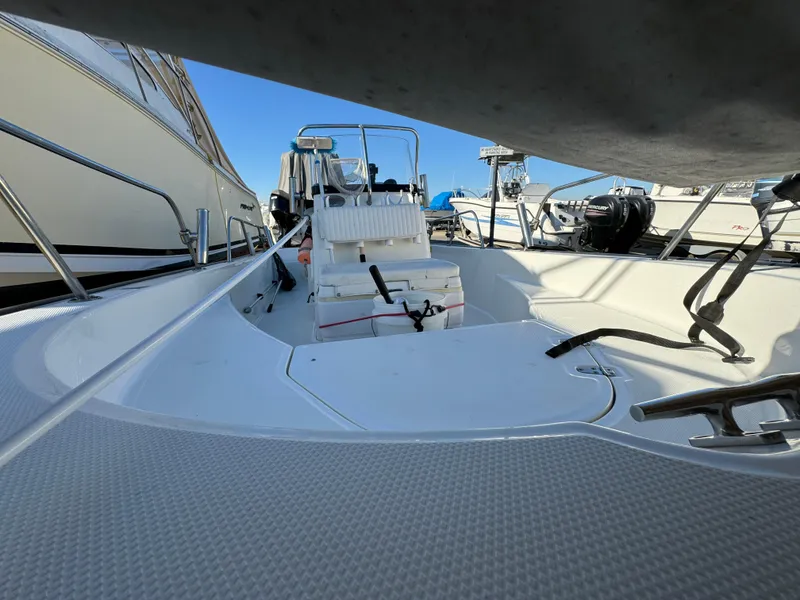 2016 Boston Whaler 170 MONTUCK boat interior, featuring seating and steering console.