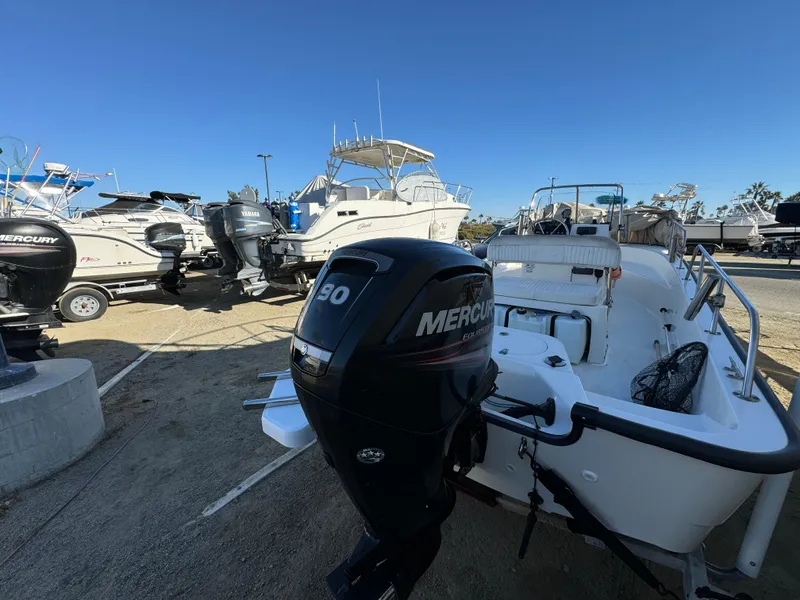 2016 Boston Whaler 170 MONTUCK with Mercury engine in a boatyard.