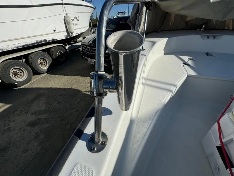 2016 Boston Whaler 170 MONTUCK boat interior with stainless steel rod holder.