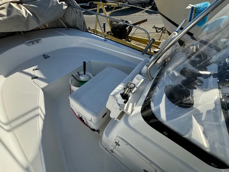 2016 Boston Whaler 170 MONTUCK boat interior with seating and console.