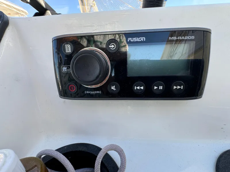 Fusion MS-RA205 stereo system on 2016 Boston Whaler 170 MONTUCK boat dashboard.