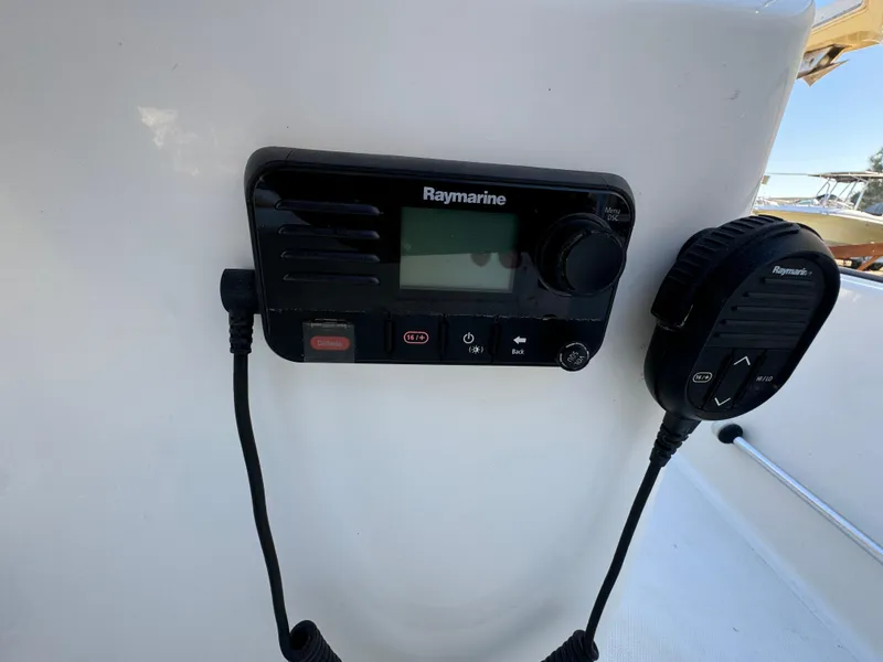 Raymarine marine radio on 2016 Boston Whaler 170 MONTUCK boat dashboard.