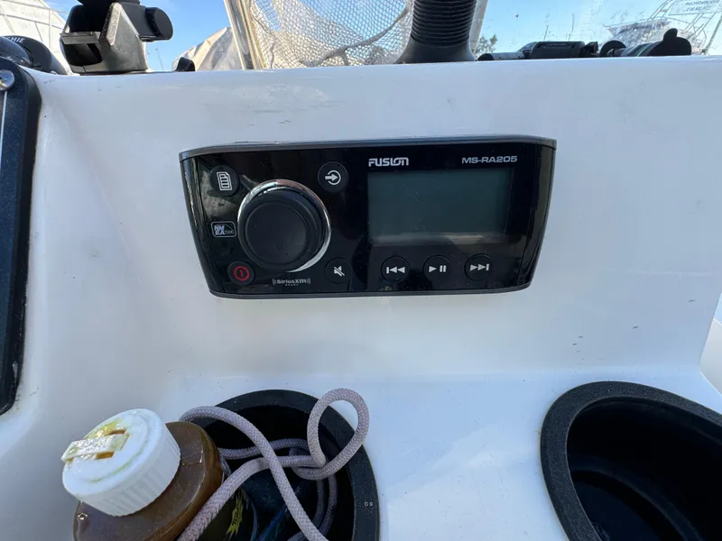 Fusion marine stereo on 2016 Boston Whaler 170 MONTUCK boat dashboard.