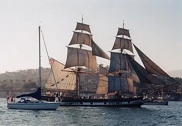 beside a tall ship