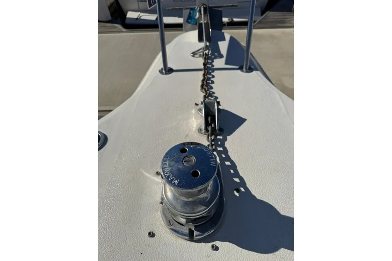 1990 Sea Ray 380 Aft Cabin boat deck with anchor chain and winch.