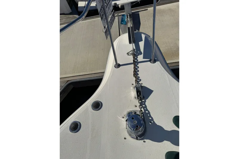 1990 Sea Ray 380 Aft Cabin boat deck with anchor chain and winch.