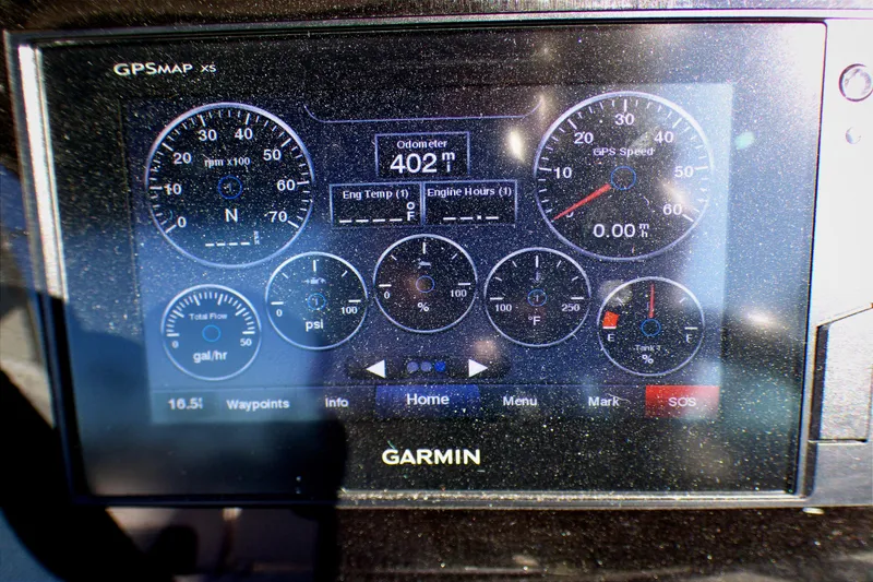 Garmin GPS display on 2018 Chaparral 267 SSX showing speed, odometer, and engine metrics.