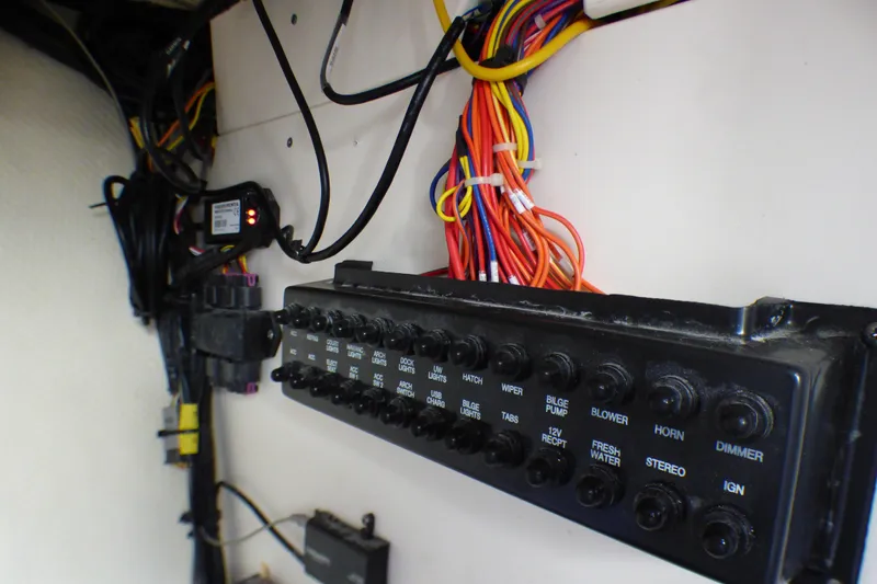Electrical panel and wiring inside a 2018 Chaparral 267 SSX boat.