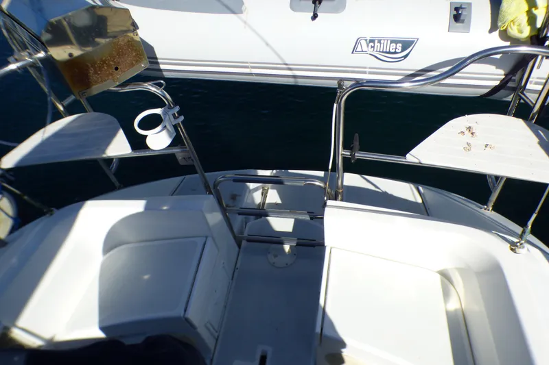 Cockpit view of 1994 Hunter Legend 35.5 sailboat with Achilles branding visible.