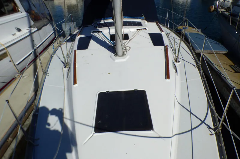 1994 Hunter Legend 35.5 sailboat deck view, docked at marina.