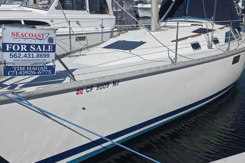 1994 Hunter Legend 35.5 sailboat for sale at marina, contact Seacoast Yachts.
