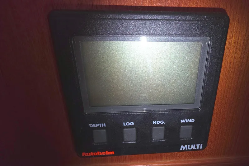 Autopilot display panel on 1994 Hunter Legend 35.5 sailboat, featuring depth, log, heading, wind.