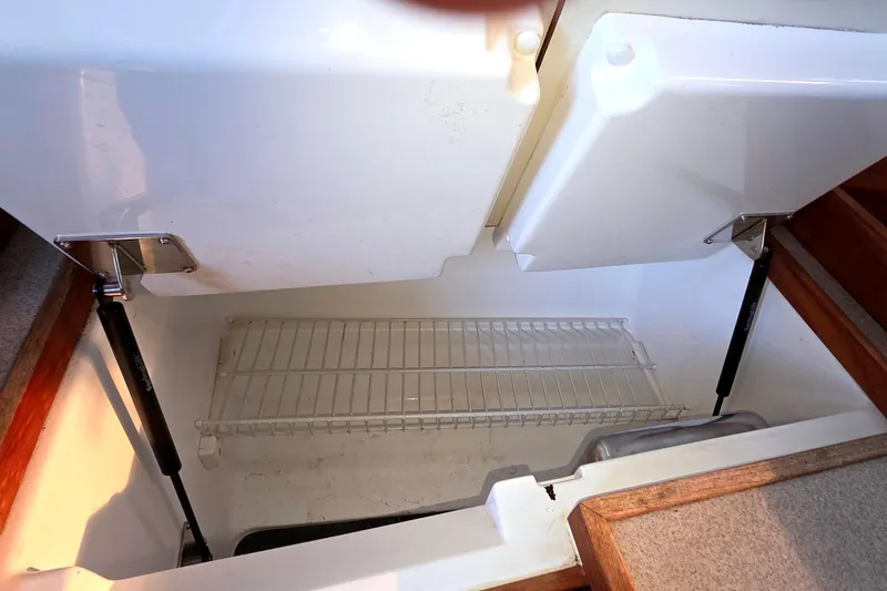 Interior view of a 1994 Hunter Legend 35.5 yacht refrigerator compartment.