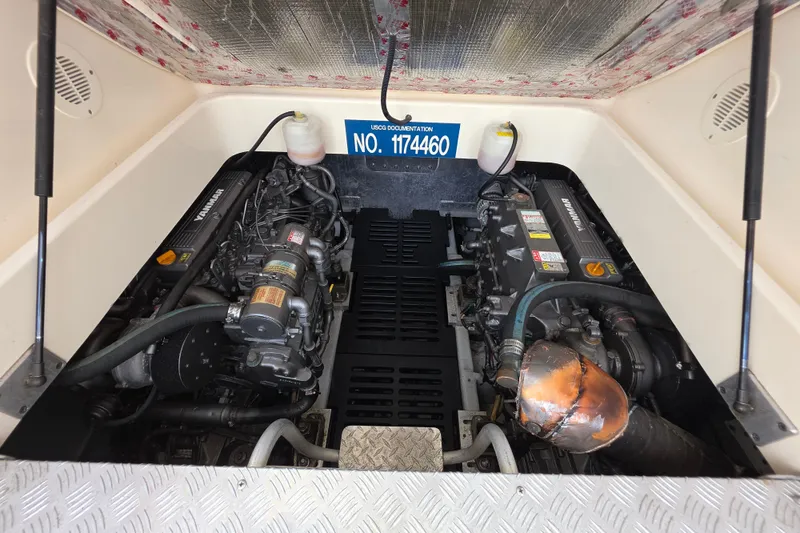 Engine compartment of 2005 Mainship 34 Pilot Sedan Rum Runner II with twin Yanmar engines.