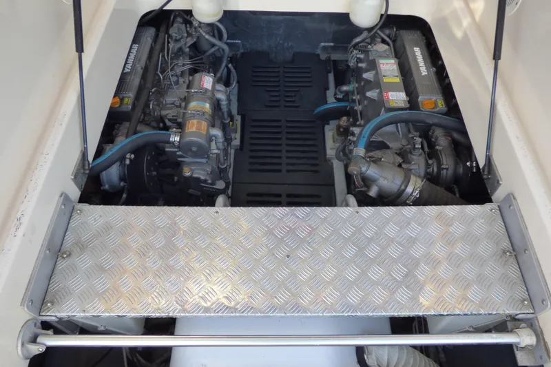 Engine compartment of 2005 Mainship 34 Pilot Sedan Rum Runner II with dual engines.