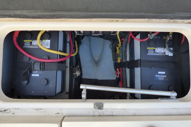 Battery compartment of 2005 Mainship 34 Pilot Sedan Rum Runner II with wiring.