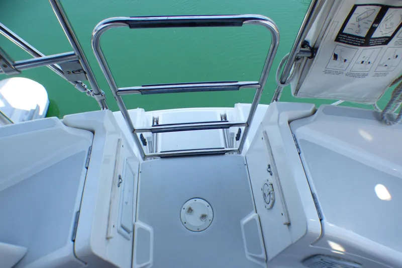 Sailboat deck view, Hunter 40.5, 1993 model, with stainless steel ladder and storage compartments.